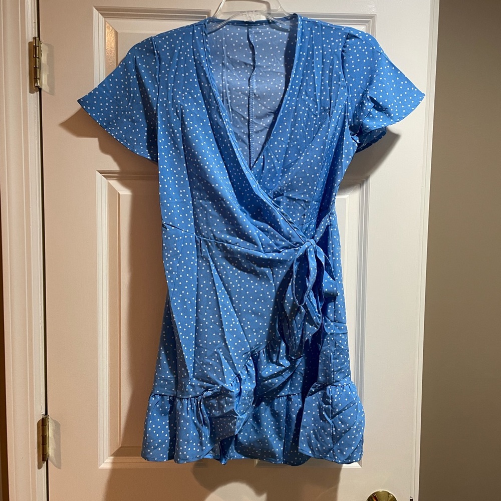 Naggoo polka dot wrap dress.